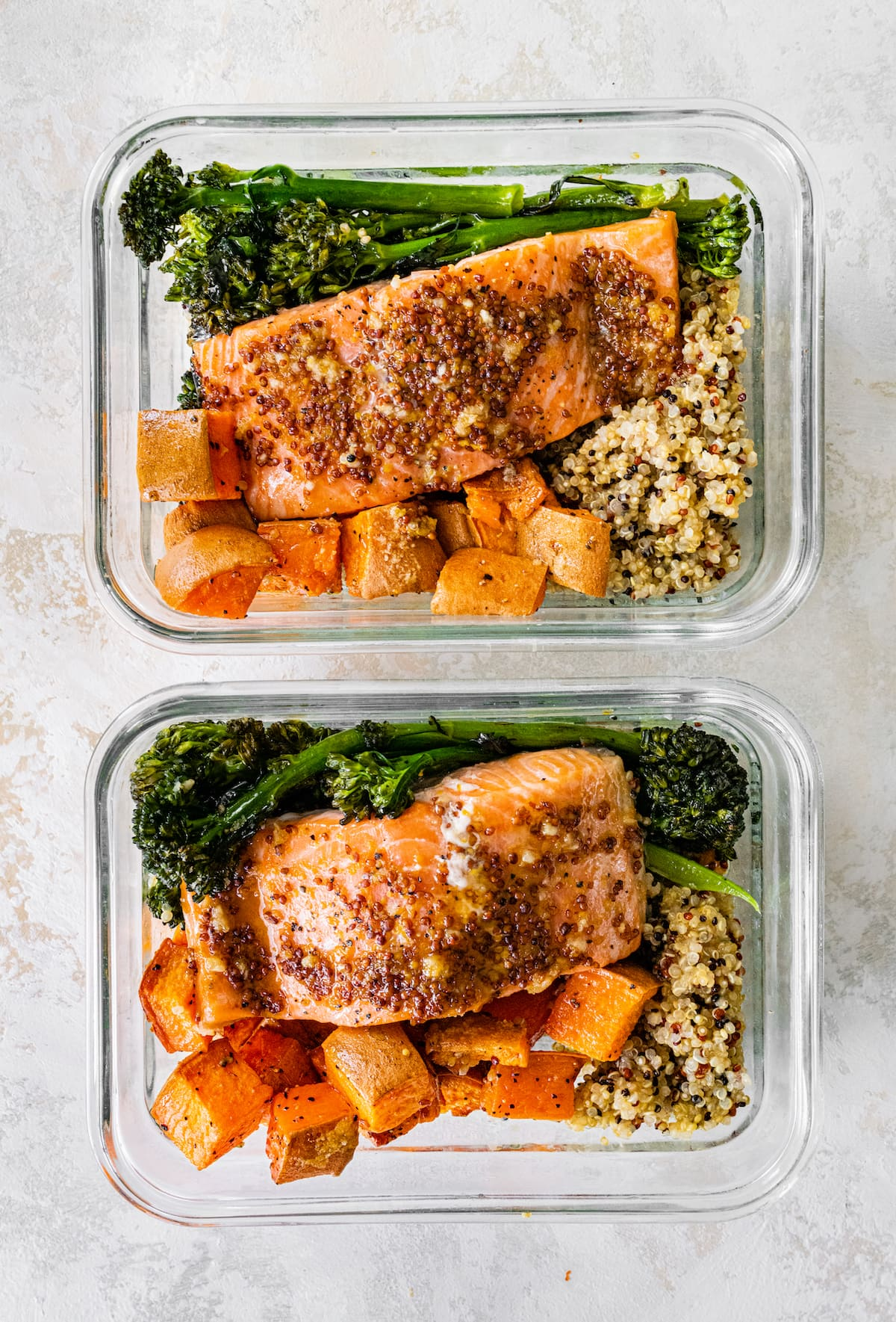 Salmon meal prep bowl with vegetables and grains